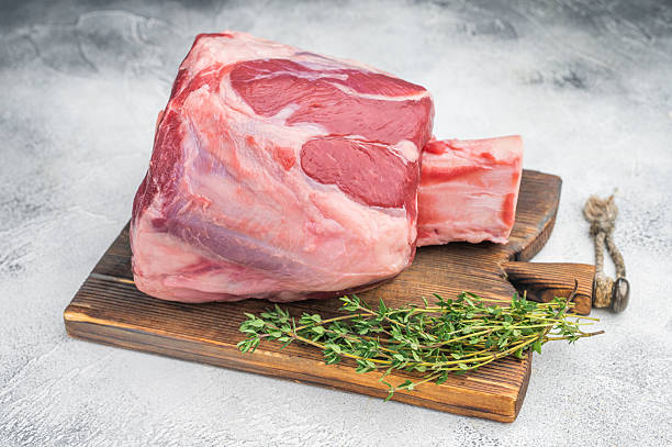 istock Fresh raw beef shank knuckle whole cut with bone styled with thyme and salt copy space on stone background ingredient for ossobuco 2251324173