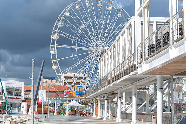 Limassol, Cyprus - December 14, 2019: Ferris wheel standing tall in Limassol Old Port