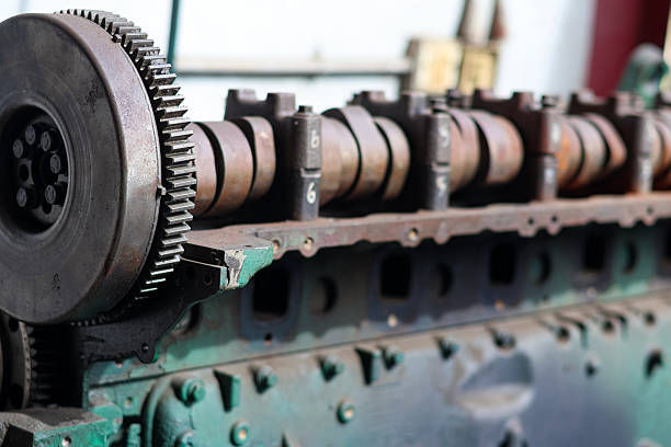 istock an exposed engine block and camshaft with a large gear 2251334072