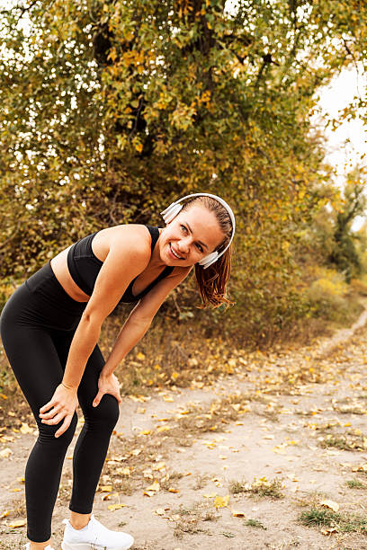 istock Female athlete resting outdoors after running in autumn 2251339001