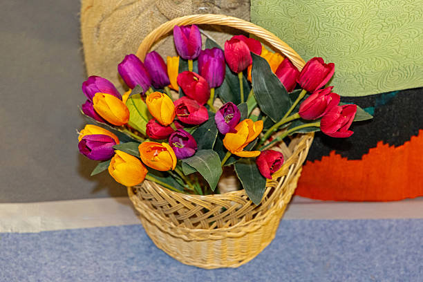 Bouquet of Colourful Artificial Tulips in Woven Vicker Basket