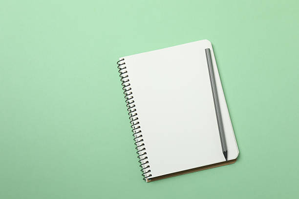 istock PNG, Notebooks with pens, isolated on green background 2251342289