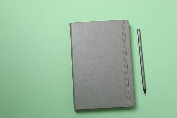 istock PNG, Notebooks with pens, isolated on green background 2251342296