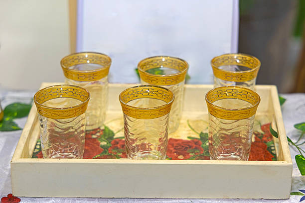 Set of Six Crystal Drinking Glasses With Gold Rim at Tray Luxury Holidays Serving