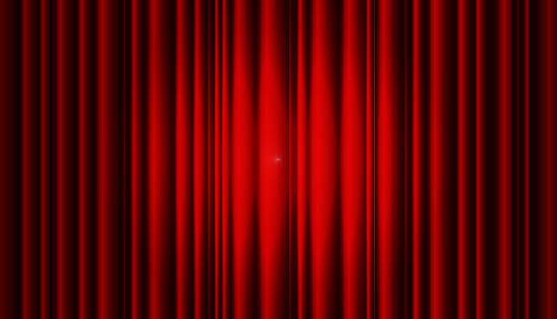 istock A red velvet or silk theater curtain with a centrally illuminated round spotlight on the stage. A luxurious red vector background for opera performances, film ceremonies and Broadway 2251343525