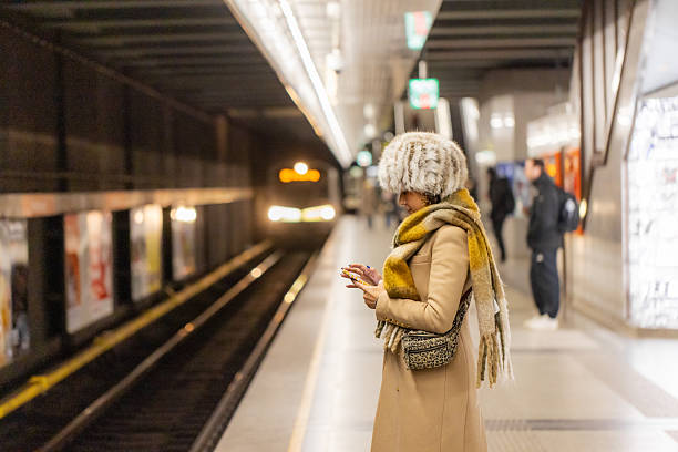 istock Stylish Passenger on Subway with Phone 2251346662