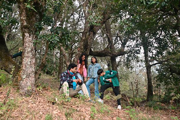 istock Children Resting with Their Naturalist Guide During Forest Nature Walk 2251347415
