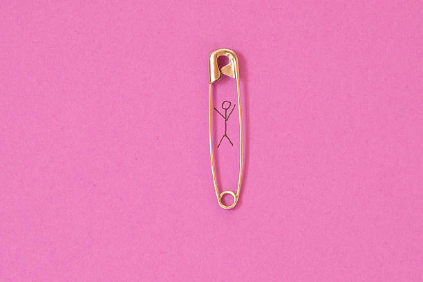 Stick figure within a safety pin is expressing joy