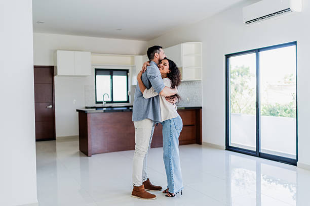 istock Couple embraced on new house 2251352031