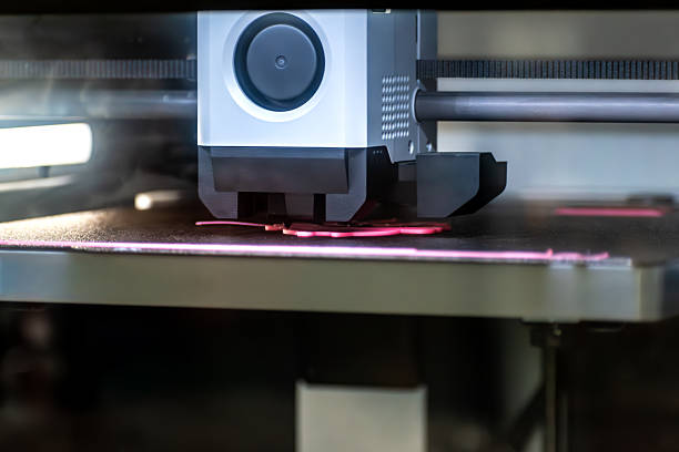 istock 3d printer printing an object on the tray with pla filament, corn starch, non-waterproof filament 2251354080