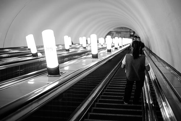 Russia, city - Moscow, August 17, 2025. Black And White Escalator In Subway Tunnel