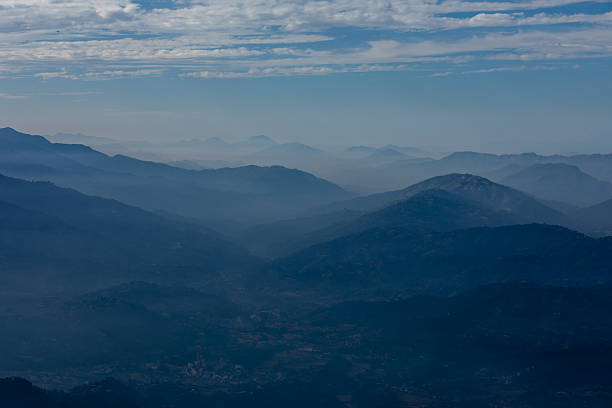 The Himalayan range stretches majestically into the horizon, seen from the Dhulikhel Hills. Each peak, glistening with snow, tells a thousand-year-old story.
