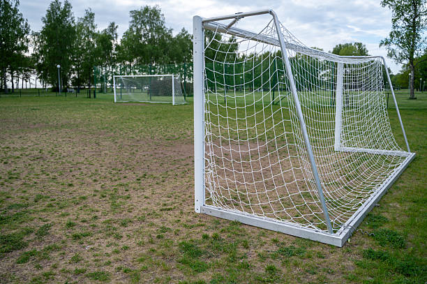 istock Football goal on small park stadium 2251357097