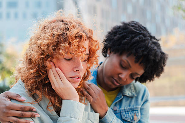 istock Two women sharing a heartfelt moment as one comforts the other during a difficult emotional situation 2251361022