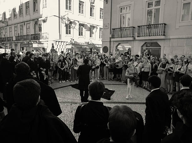 Lisbon, Portugal- October 4, 2025: A group of college students perform at the Rua Augusta street in Lisbon downtown.