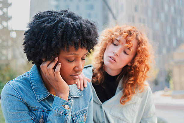istock Two friends share a heartfelt moment as one offers support during a difficult time of emotional distress 2251364949