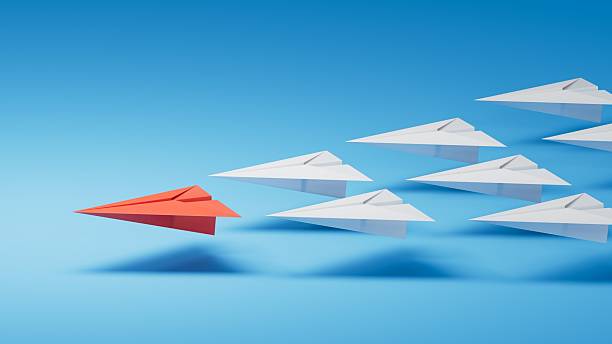 istock Different business concept.new ideas. paper art style. creative idea.Leaderplane concept with red paper plane leading among white.3D rendering on blue background. 2251367521