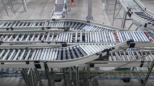 istock packing line in a logistics warehouse. conveyor belt in a modern production line 2251369352