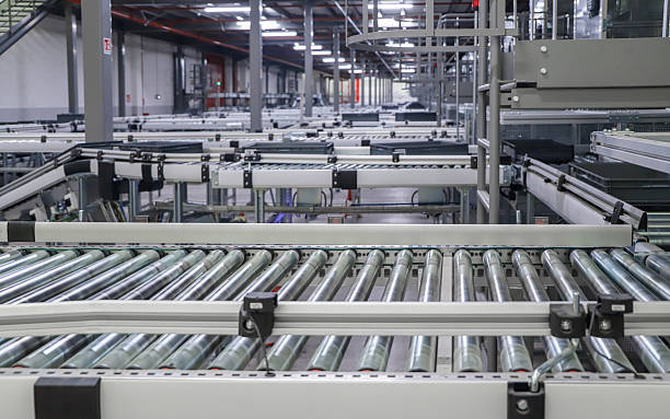istock packing line in a logistics warehouse. conveyor belt in a modern production line 2251369357