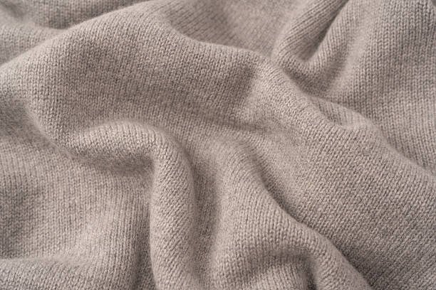 istock Soft grey merino wool sweater texture as a background. 2251374423