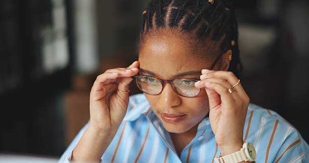 istock Reading, glasses or black woman in office with tech, draft edit or source feedback for article. Review, reflection or journalist in agency with specs, fact check or industry research for publication. 2251375822