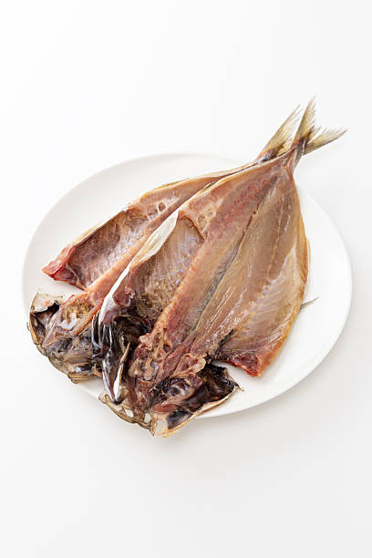 istock Dried horse mackerel on a plate on a white background 2251375932