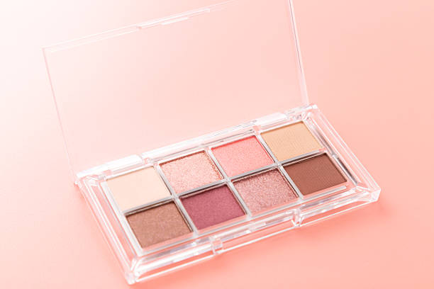 istock Eyeshadow palette on a pink background 2251376076