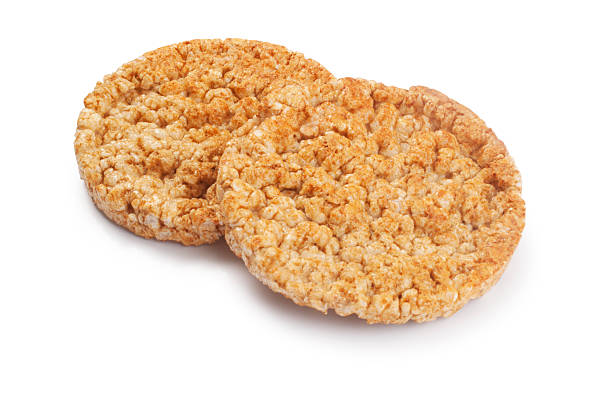 Studio shot of marmite flavoured rice cakes cut out against a white background