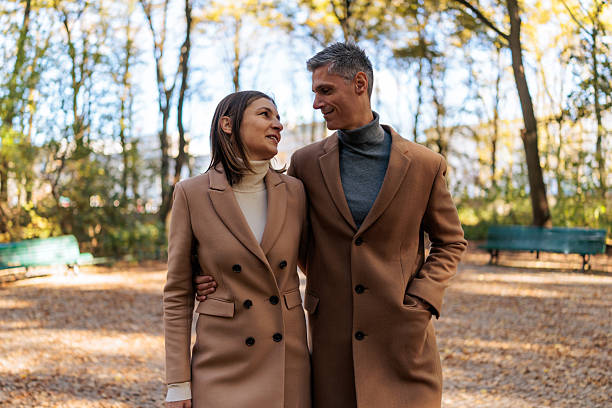 istock Couple Enjoying a Relaxing Autumn Walk in Berlin 2251392366
