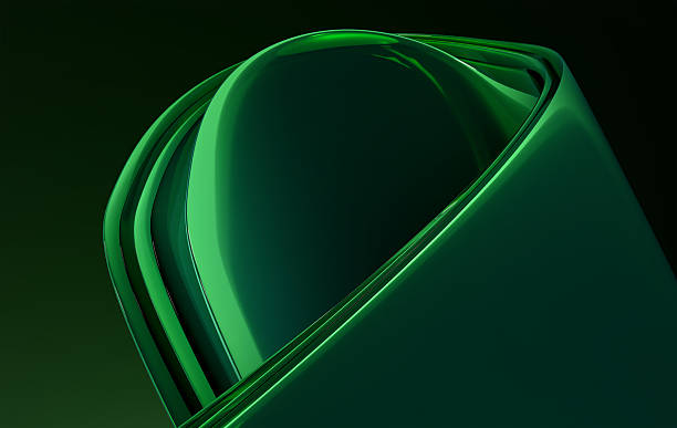 istock Green Glossy Abstract Curves with Smooth Light Reflections on Dark Background 2251392465
