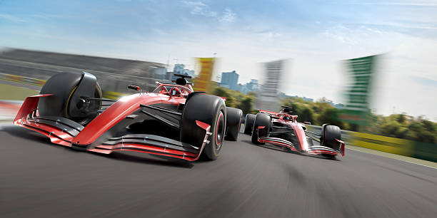 istock Two Racing Cars Taking Corner At High Speed 2251396078