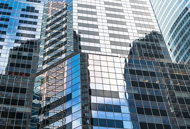istock Reflective glass background. Architecture. Building architecture. Building background. Glass building window. Architectural detail. Background of architecture. Modern glass background 2251397019