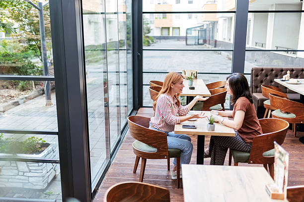 istock Ladies Enjoying Coffee 2251398179