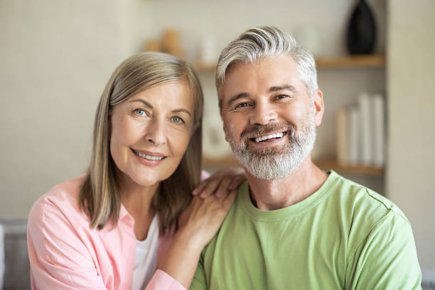 istock Happy couple looking at camera during home leisure 2251398729