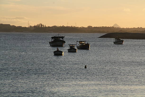istock Boats on the sea against a sunset backdrop. 2251399223