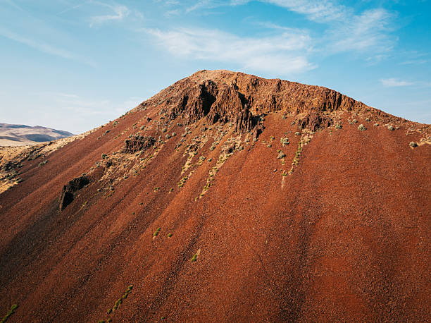 Mars colored landscape shots of mineral rich rock covered hills in Oregon state.  Beautiful geology of the state.  Drone point of view from above.