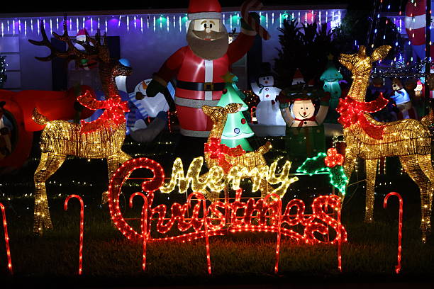 istock Christmas decoration: Part 1: Creating a festive outdoor Merry Christmas light display in Florida. 2251403599