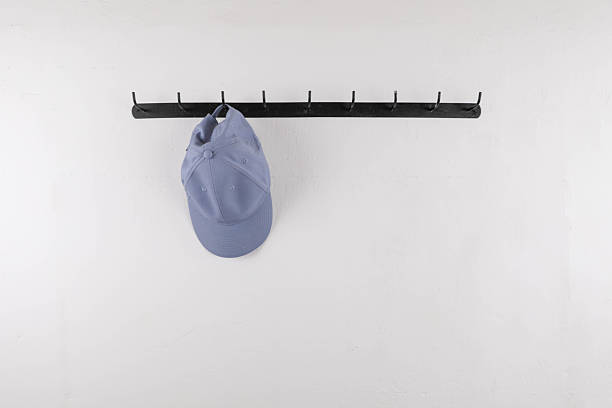 istock Baseball Cap Hanging Indoors 2251404791