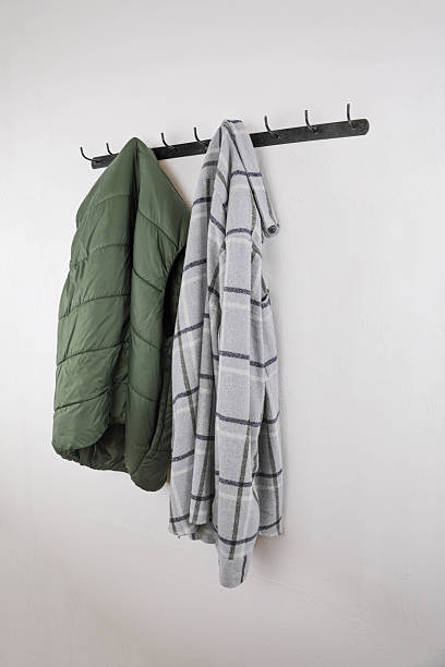 istock Winter Jacket and Shirt on Wall Rack 2251405124
