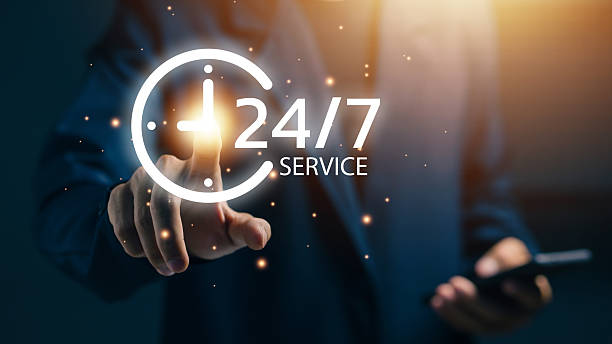 istock A user touches a glowing 24/7 service clock icon, representing nonstop customer support, business availability, digital services, and continuous assistance for modern communication platforms. 2251408893