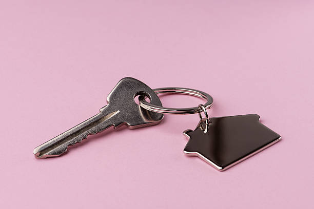 istock house keys on a pink background 2251415695