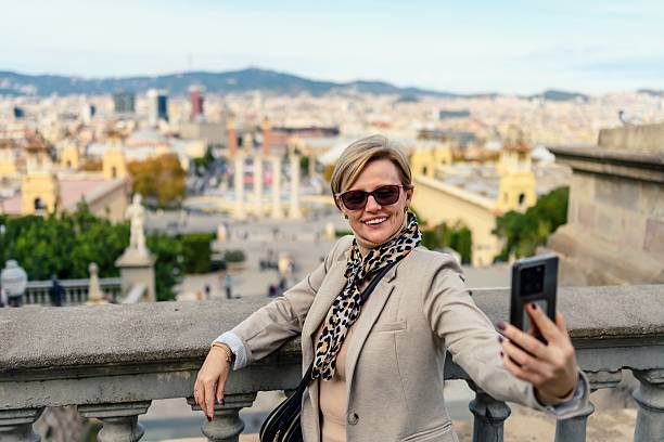 A tourist makes memories in Barcelona