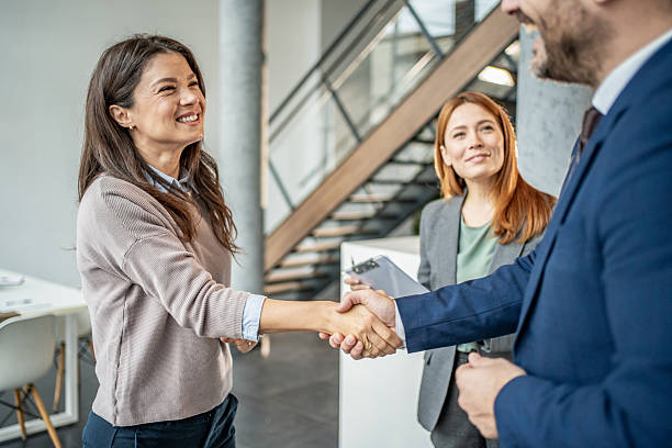 istock Business partners shaking hands making a deal 2251417988