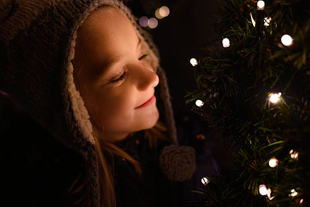istock Child joyfully admiring holiday lights 2251418505