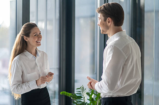 istock Two colleagues having a conversation in the office 2251423372