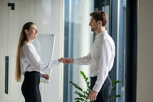 istock Business colleagues having a meeting and shaking hands 2251423375