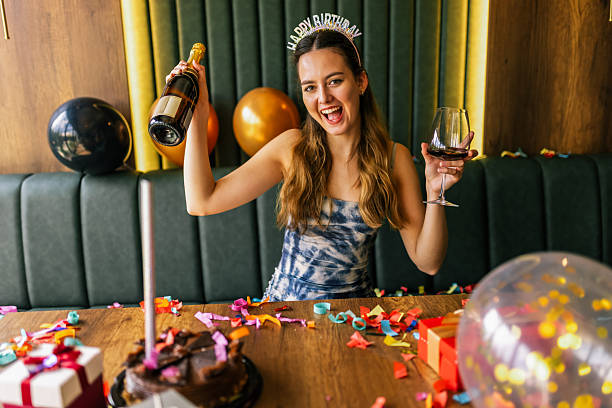 istock Birthday Girl With Wine 2251423475
