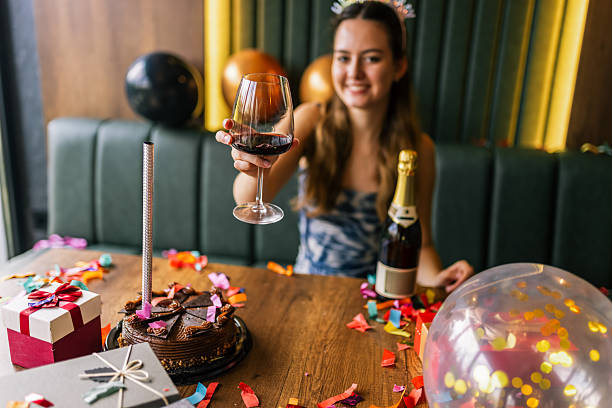 istock Birthday Girl With Wine 2251423537