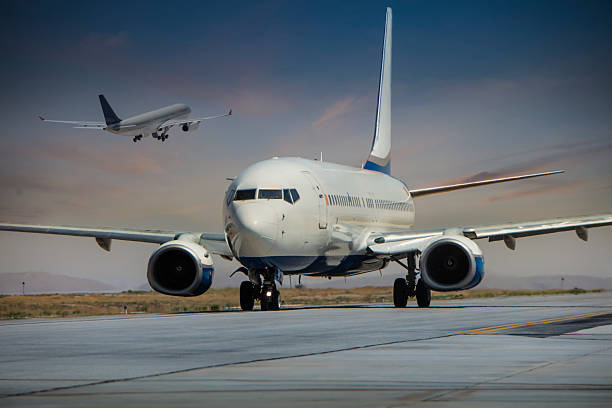 Passengers onboard Iberia Airbus A340 aircraft. Iberia is part of International Airlines Group (IAG, parent company) and of Oneworld alliance.