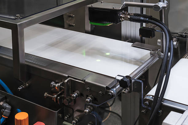 istock Conveyor belt for packaging with laser motion sensors 2251431241